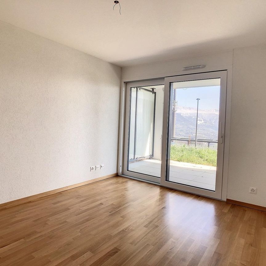 Bel appartement de 3.5 pièces au rez bénéficiant d'une belle terrasse. - Foto 1