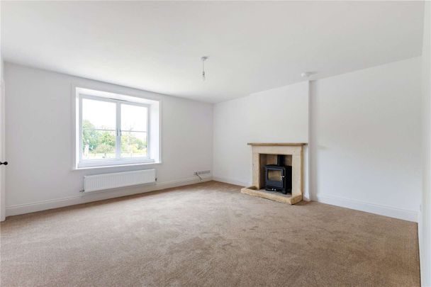 A beautifully renovated five bedroom detached farmhouse, situated just outside Winchcombe, offering generous living space and a large garden with hillside views. - Photo 1