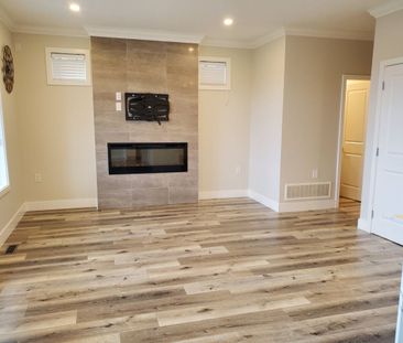 Bright, Open Concept Upper! - Photo 2