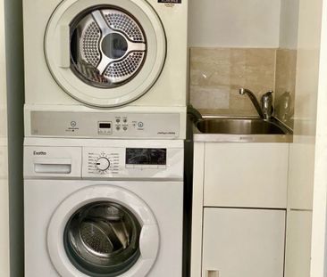 FULLY FURNISHED TWO BEDROOM APARTMENT WITH A/C IN EVERY ROOM! - Photo 6