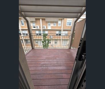 Private and Modern 1-Bedroom Apartment with Balcony - Photo 3