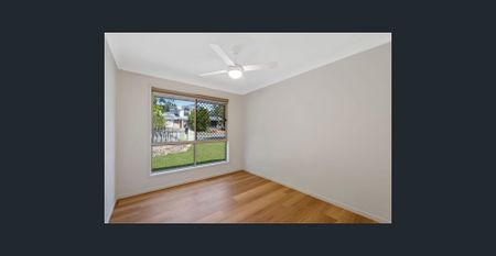 Updated Family Gem with Extra Living Space and Easy-Care Style - Photo 4