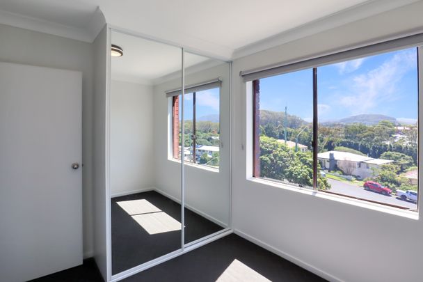 Modern Comfort in a Convenient Coastal Setting - Photo 1