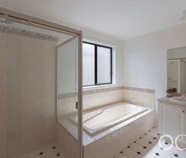 Open the Door to Spacious Comfort in Sought-After Magill - Photo 2