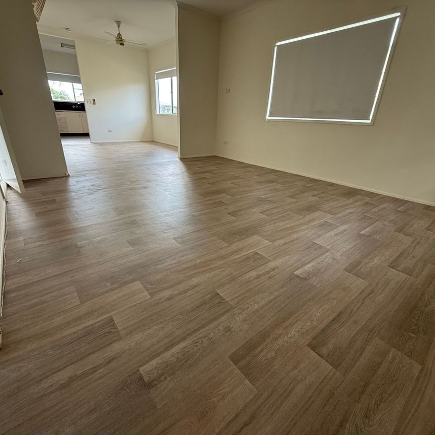 Neat and Tidy High Set with Fresh Pain and Flooring - Photo 1