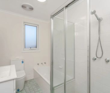 Updated 3 Bedroom Cottage in Prime Location - Photo 6