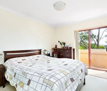 Three Bedroom Townhouse in Desirable Location - Photo 1
