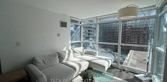 Feels brand new entertainment district + den parking included! - Photo 2