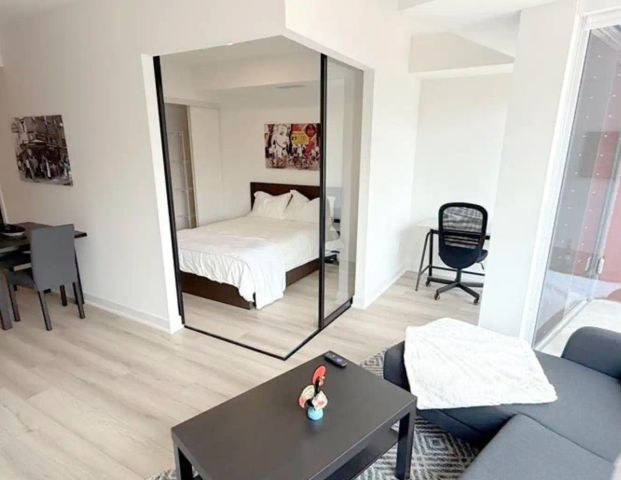 Stylishly furnished 1+den in the heart of Trinity Bellwoods & Queen West Available Now — 203 - Photo 1