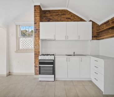 Neat 2-Bedroom Home in Small Complex of 3 - Photo 1