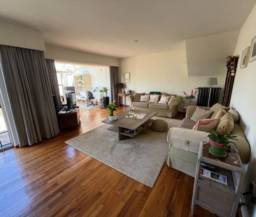 Luxueus gelijkvloers appartement met 3 slaapkamers, tuin en garage - Foto 1