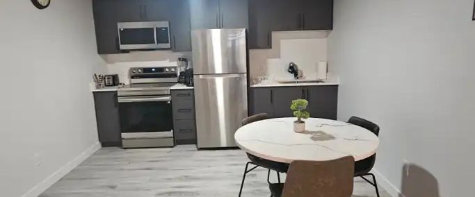 Modern 1-Bedroom Furnished Basement Suite – Utilities Included, Move-In Ready | 1625 Siskin Link Northwest, Edmonton - Photo 1