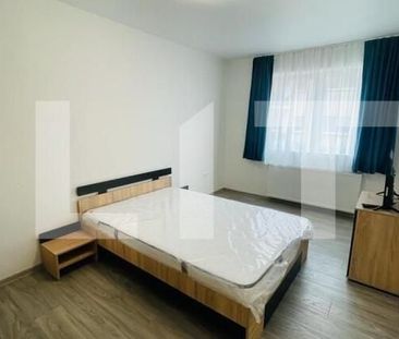 Apartament 2 camere, decomandat, 56mp, etaj intermediar, parcare, zona Florilor - Fotografie 4