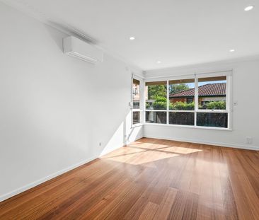 RENOVATED 2 BEDROOM UNIT IN CARNEGIE'S TOP SPOT - Photo 1