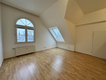 Zentral und ruhig gelegene Dachgeschoßwohnung mit Terrasse! - Foto 4