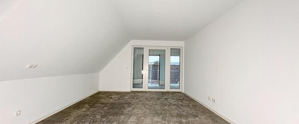 Exklusive Dachgeschosswohnung zur Warmmiete - Foto 1