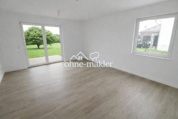 Stilvoll saniert & sofort bezugsfrei – Doppelhaushälfte mit großem Garten in ruhiger Lage - Foto 1