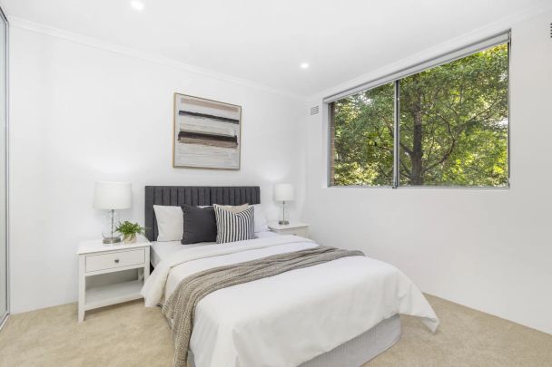 Renovated Three-Bedroom Retreat in Ultra Convenient Location Moments from Everything - Photo 1