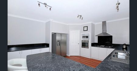 Modern Family Home with Multiple Living Areas & Side Access - Photo 4