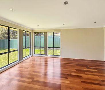 THE IDEAL FAMILY HOME IN SOUGHT-AFTER WARNERS BAY - Photo 1