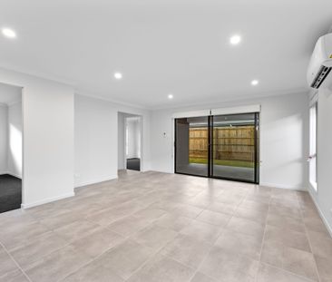 71 Amundsen Drive, Logan Reserve QLD 4133 - House For Rent | Domain - Photo 6