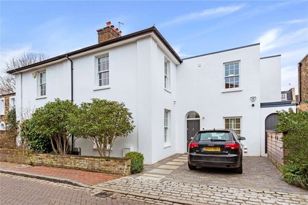 A stunning extended and meticulously refurbished house on arguably one of West Putney's prettiest streets. - Photo 4