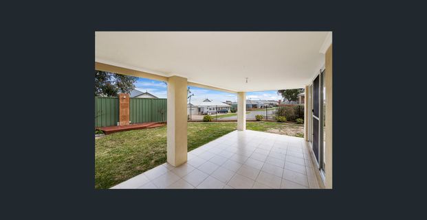 Family Oasis: 4-Bed House with AC, Modern Kitchen & Easy-Care Gardens - Photo 1