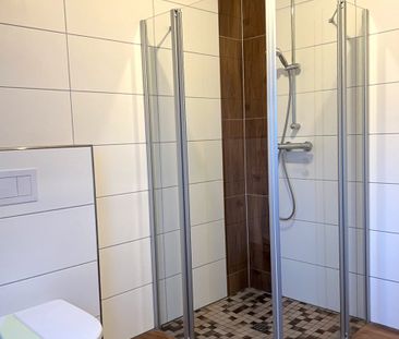 Moderne 2-Zimmer-Oberwohnung mit Balkon in Warsingsfehn! - Foto 1