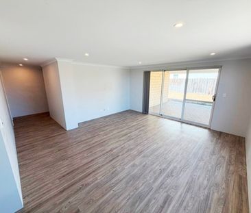 Coastal Comfort & Modern Living in Prime Halls Head Location - Photo 1