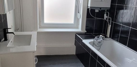 Location Appartement 2 pièces 58m² REMIREMONT 88200 - Photo 2