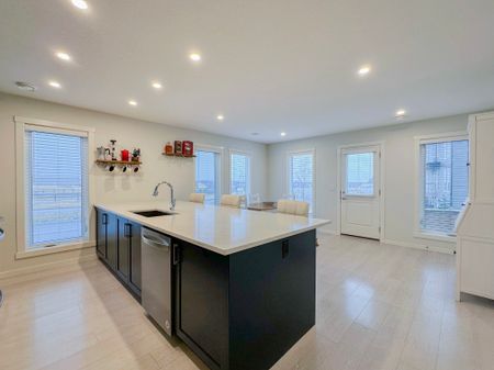 Private Rooftop Patio & Bonus Room | 2 Bed Townhouse In Vibrant Seton - Photo 5