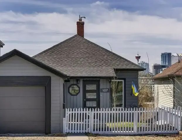 2 Bedroom House in Bridgeland with City Skyline View | 107 Thomson Avenue Northeast, Calgary - Photo 1