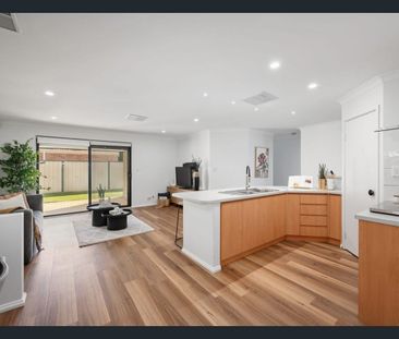 Spacious Family Living in a Convenient Queens Park Location - Photo 3