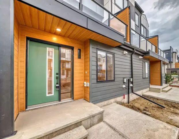 Brand new Townhome in Easthills Crossing close to major retailers | 111 - 8500 19 Avenue Southeast, Calgary - Photo 1