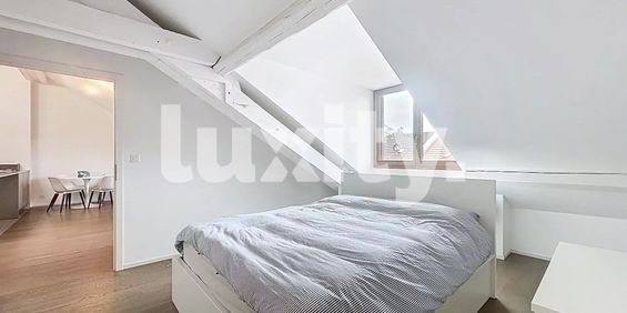 Renovated attic with modern comfort - Photo 3