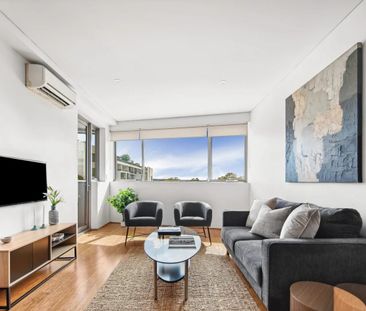 Modern One-bed + Study Apartment of Space and Convenience - Photo 1