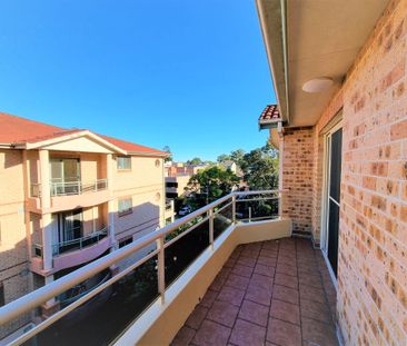 SECURITY AND SPACIOUS TWO BEDROOM UNIT - UPGRADED - Photo 3