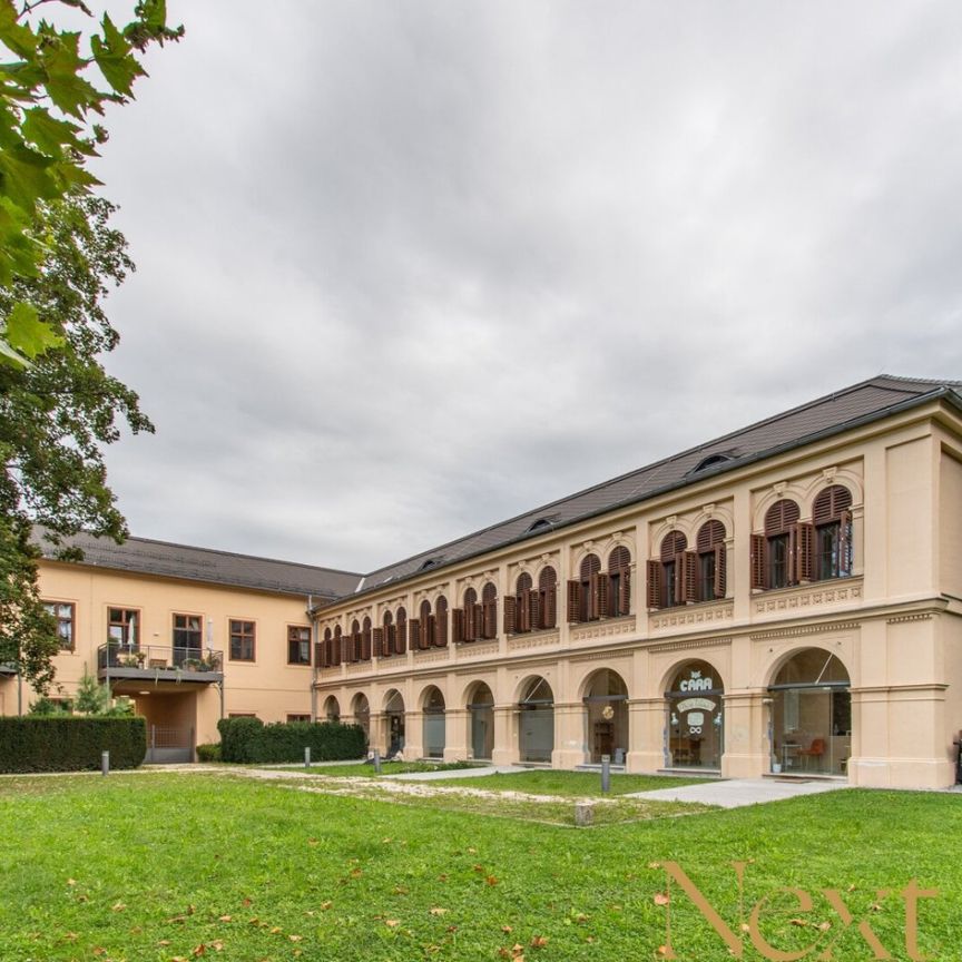 Charmante 2,5-Zimmer-Wohnung mit gemütlichem Eigengarten im Palais Löwenfeld ab sofort zu vermieten! - Photo 1