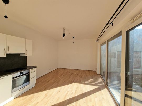 Schicke Neubauwohnung mit kl. Garten in idyllischer Ruhelage - Photo 1