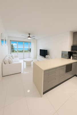 2 x 2 x 1 UNIT- COASTAL LIVING AT IT'S BEST- STEPS FROM THE BEACH - Photo 1