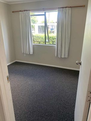 Affordable 3-Bedroom Home with Decent Garage - Photo 1