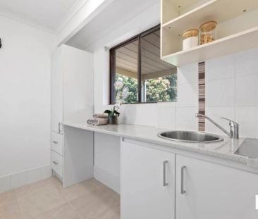 Modern 2-Bedroom Unit with Low-Maintenance Yard - Photo 2