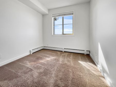 AMAZING & FAMILY FRIENDLY 2 BED, 1 BATH APARTMENT W/ UNDERGROUND PARKING STALL IN THE COMMUNITY OF RUTHERFORD - Photo 2