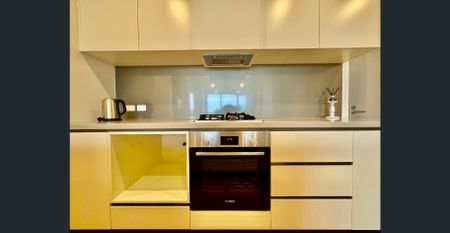 Stylish Two-Bedroom Furnished Apartment with Spectacular City Views - Photo 5