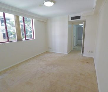 "STUNNING 1 BEDROOM WITH PARKING AT MILLENNIUM TOWERS" - Photo 4