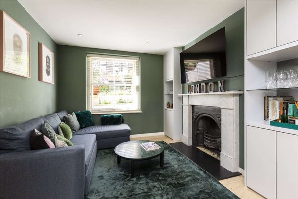 Stunning three bedroom terraced house refurbished to an excellent standard throughout. - Photo 1