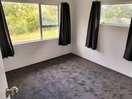 Charming 2BR Unit with Garden! - Photo 1