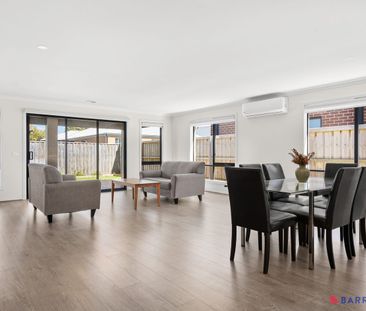 Light-Filled Four-Bedroom Home Designed for Easy Family Living - Photo 1