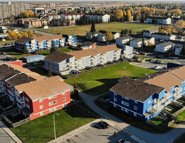 The Courtyards Apartments | 9818 94th Avenue, Grande Prairie - Photo 1