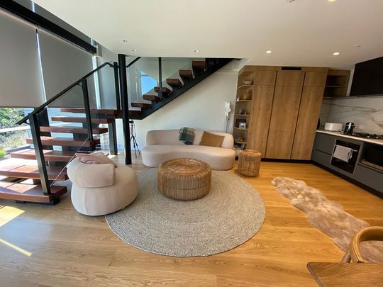 Immaculate loft style apartment with water views - Photo 1